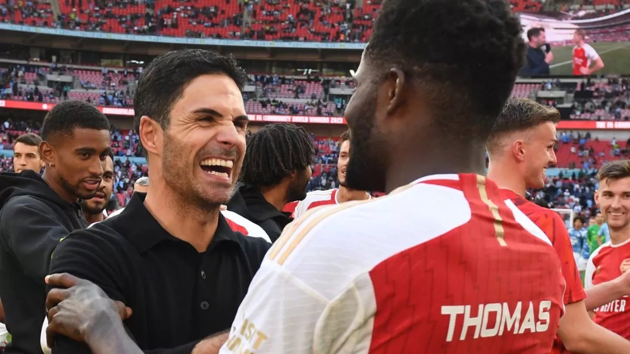 Thomas Partey and Mikel Arteta post-match